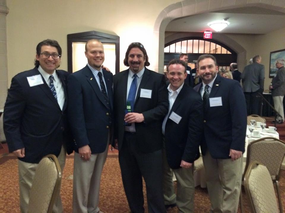 Photo of Don with four members of his singing group with the University of Pittsburgh Men's Glee Club